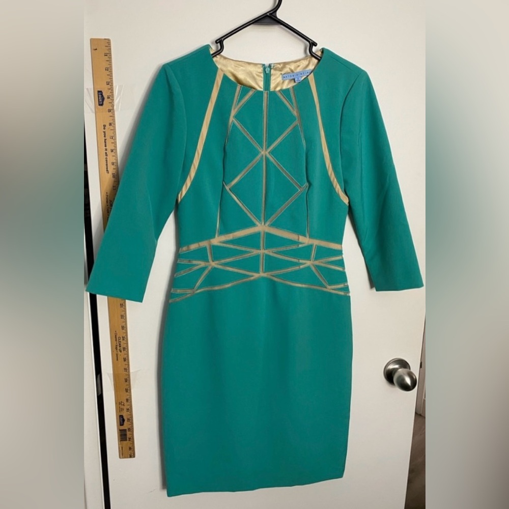 Antonio Melani turquoise dress with nude mesh inserts. Fitted, lined. Size 4.